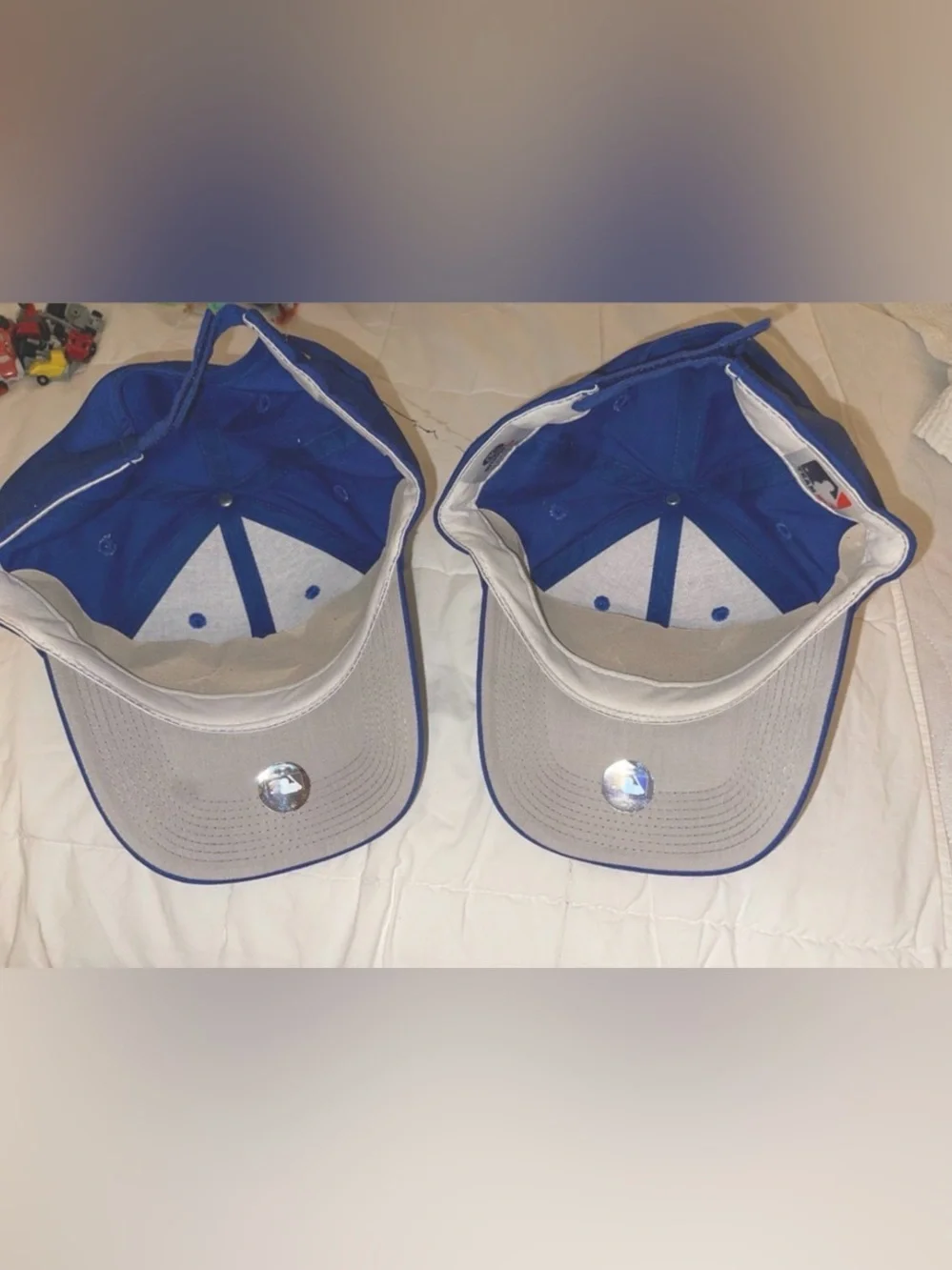 Pair of Blue Baseball Cap with Red Accent - Official MLB Team Logo